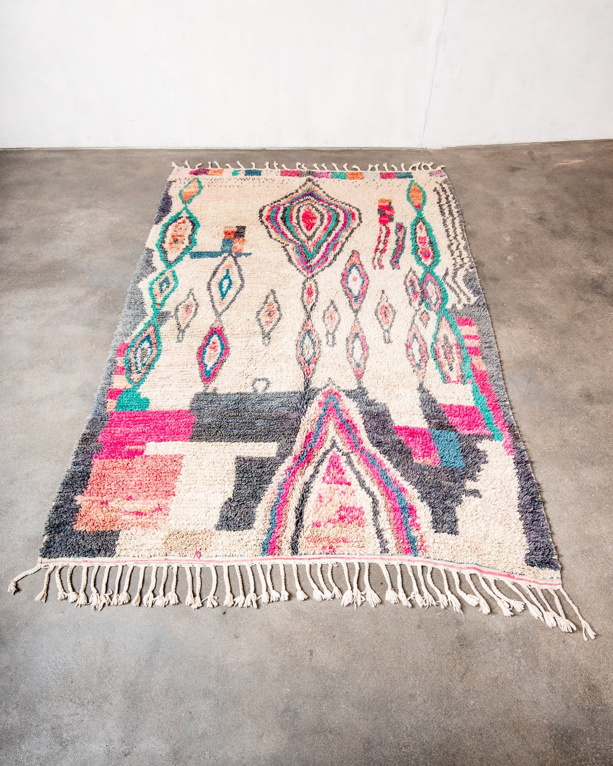 Modern, designer, handcrafted Berber rug from Morocco. Vintage carpet with beautiful colours and patterns and fluffy texture.